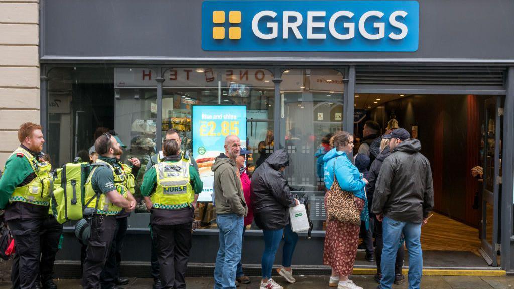 Greggs' sales top £2bn after pizza boost but sausage roll still king - BBC News